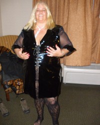 Mature Fetish BBW in Latex, PVC and Vinyl Plays with Toys photo