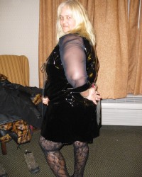Mature Fetish BBW in Latex, PVC and Vinyl Plays with Toys photo