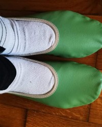 Girl in green slippers photo
