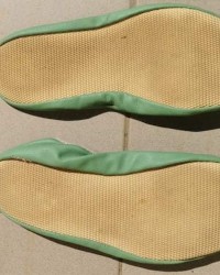 Girl in green slippers photo