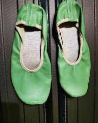 Girl in green slippers photo