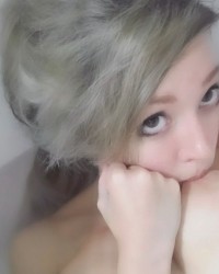 Nipple play / sucking own nipples photo