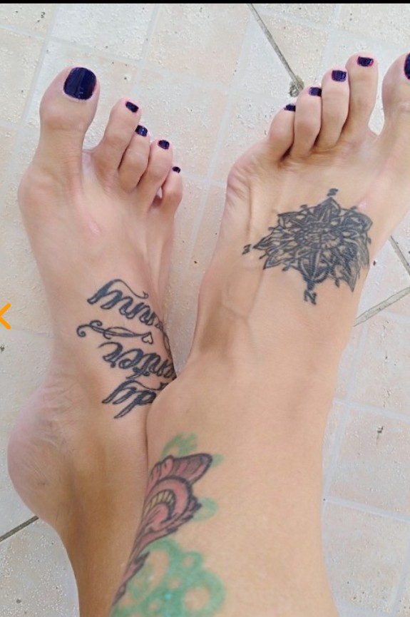 Sexy tattooed feet