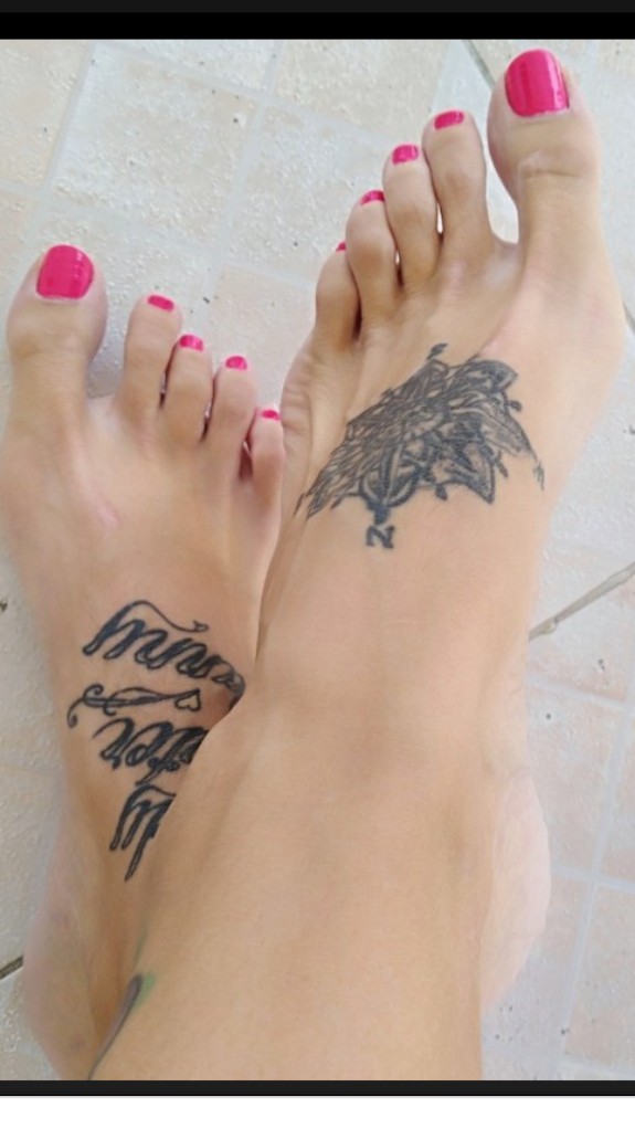 Sexy tattooed feet