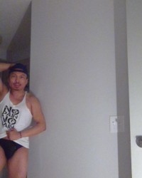 Flexing In Black Speedos! photo