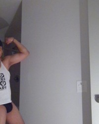 Flexing In Black Speedos! photo