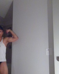 Flexing In Black Speedos! photo