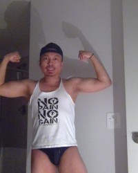 Flexing In Black Speedos! photo