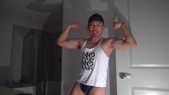 Flexing In Black Speedos!