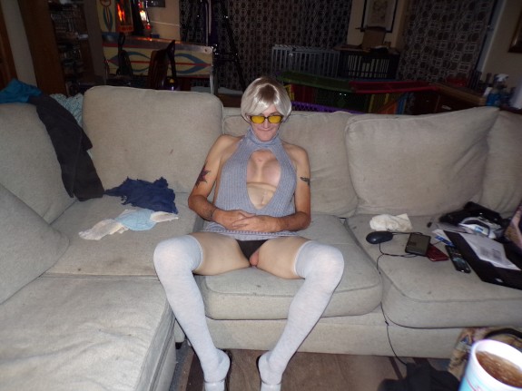 sissy slut in sex swing suckig