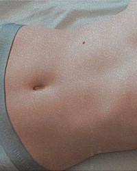 Naked in bed photo