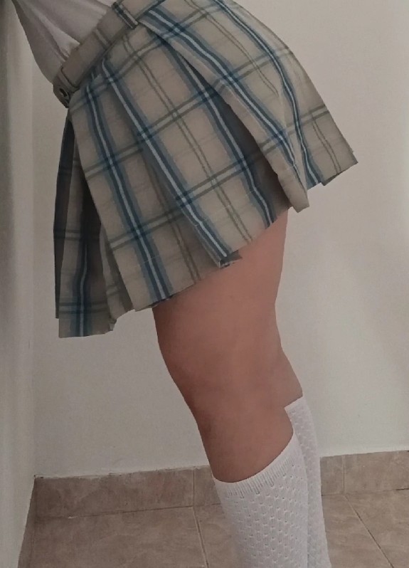 Wearing my school uniform. Do you like my skirt? ❤️❤️❤️