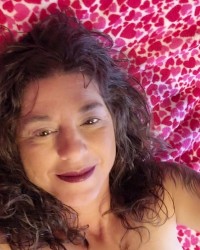 Sexy milf poses and squirts photo