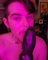 Sucking a fake werewolf cock, and thinking of you. photo