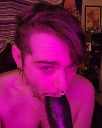 Sucking a fake werewolf cock, and thinking of you. photo