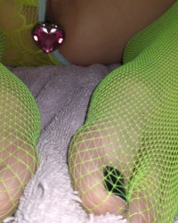 Green panties and pink heart butt plug photo