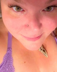 Hazel eyes and thick thighs photo