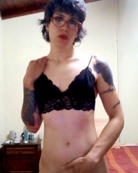 Leggy trans girl Dhananjay Ionova poses in lingerie and shows dick photo