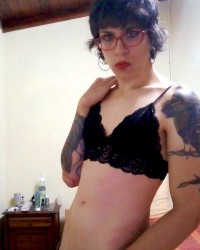 Leggy trans girl Dhananjay Ionova poses in lingerie and shows dick photo