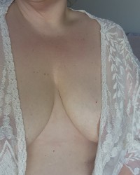 Big Boobs get covered in CUM photo