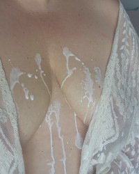 Big Boobs get covered in CUM photo