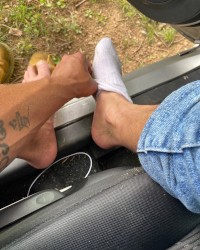 Just finished cutting a yard for some extra money! Needing my feet rubbed! photo
