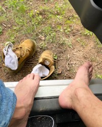 Just finished cutting a yard for some extra money! Needing my feet rubbed! photo