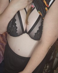 Big Udder Submissive Showing Off New Bra and Garters photo