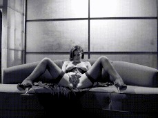 Pinup beauty Bobbi Starr masturbating on couch gif