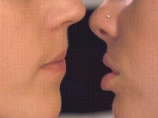 tentative kissing gif