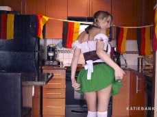 Katie Banks bends over and teasese in German costume gif