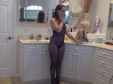 On phone in bodystocking p1 gif