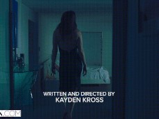 Tori  walks into darkened bedroom while smoking gif