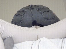 Slut pisses on guys lap in jeans gif