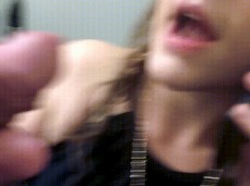 Girl Happily Takes Cum in Mouth While on the Phone gif
