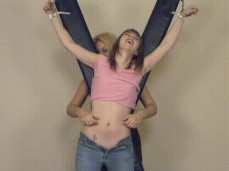 tied up hot girl tickling tummy with feather gif