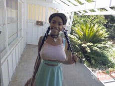 Big tit girl jumps up and down to show off her boobs gif