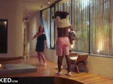 Ella Hughes undresses and leads two  studs towards bedroom 01b gif