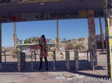 Angela White in boots and thong walks away 01 gif