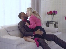 Businesswoman Cherie Deville climbs on  stud's lap to kiss 02 gif