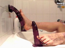 Goddess Hira, Footjob to 2 dildos at the same time gif