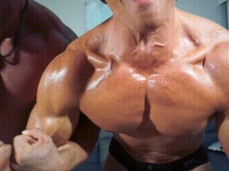 Bodybuilder Gunnar Stone and buddy posing 0057-1 gif