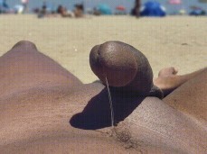Juicy  cock oozing precum on a public beach 0119-1 3 pov gif