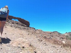 Cute brunette wearing backpack and showing ass gif