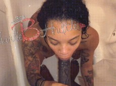 She sucks his big dick in the shower gif