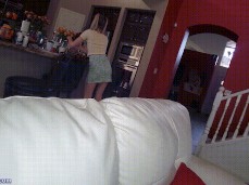 Lily Larimar Walks Into The Kitchen To Grab A Cookie From The Cookie Jar gif