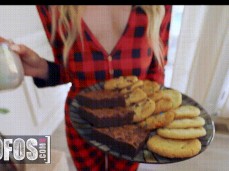 Lily Larimar Standing With A Plate Of Cookies And A Glass Of Milk gif
