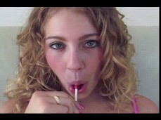 Mysti makes a lollipop look very juicy and tasty gif