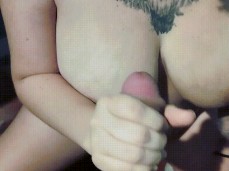 Tattooed mom gets cum on her tits gif