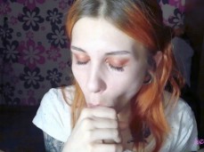 Redhead beauty gives great blowjob gif